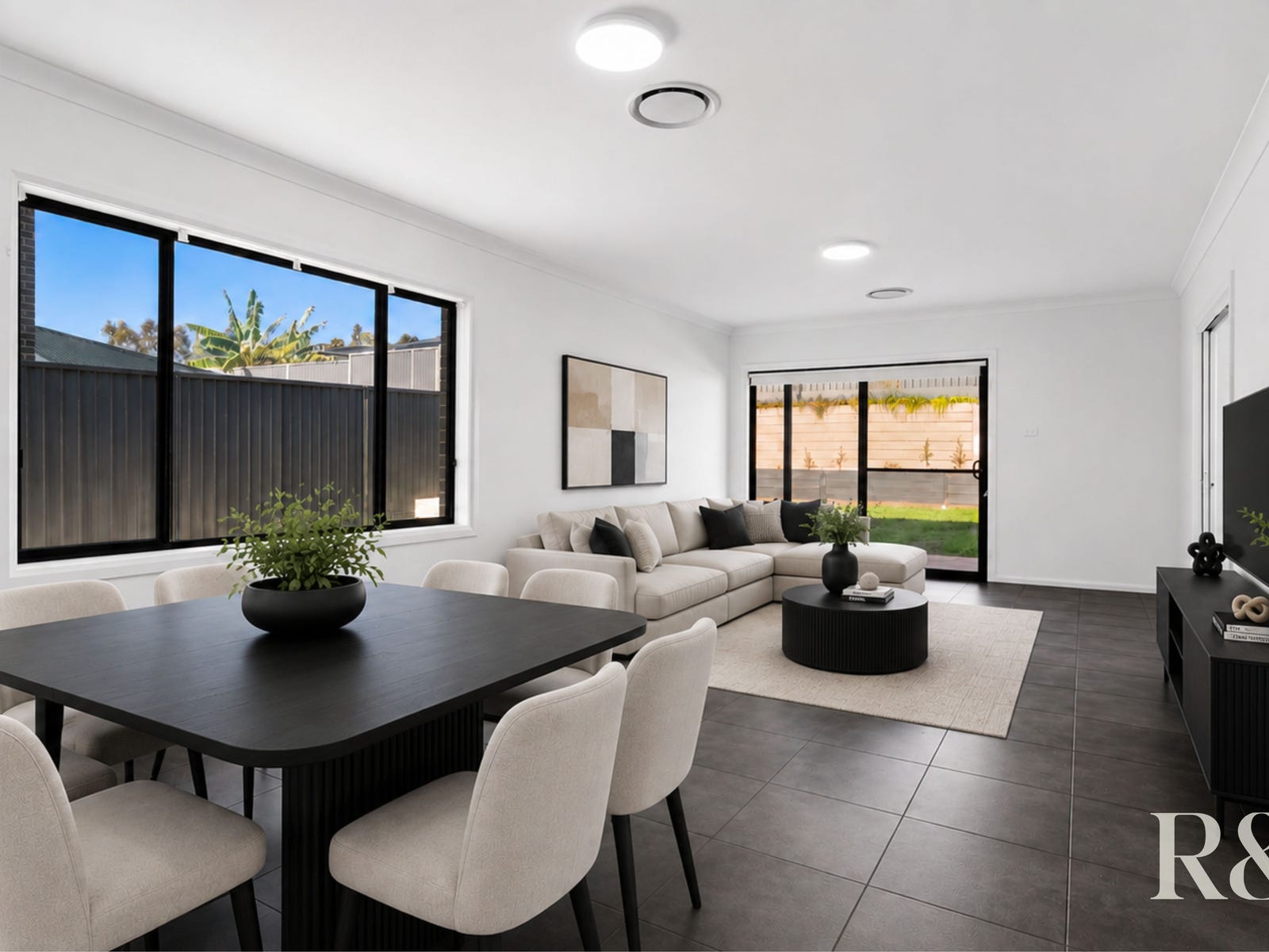 Open-plan living and dining at 9 Arkley Avenue