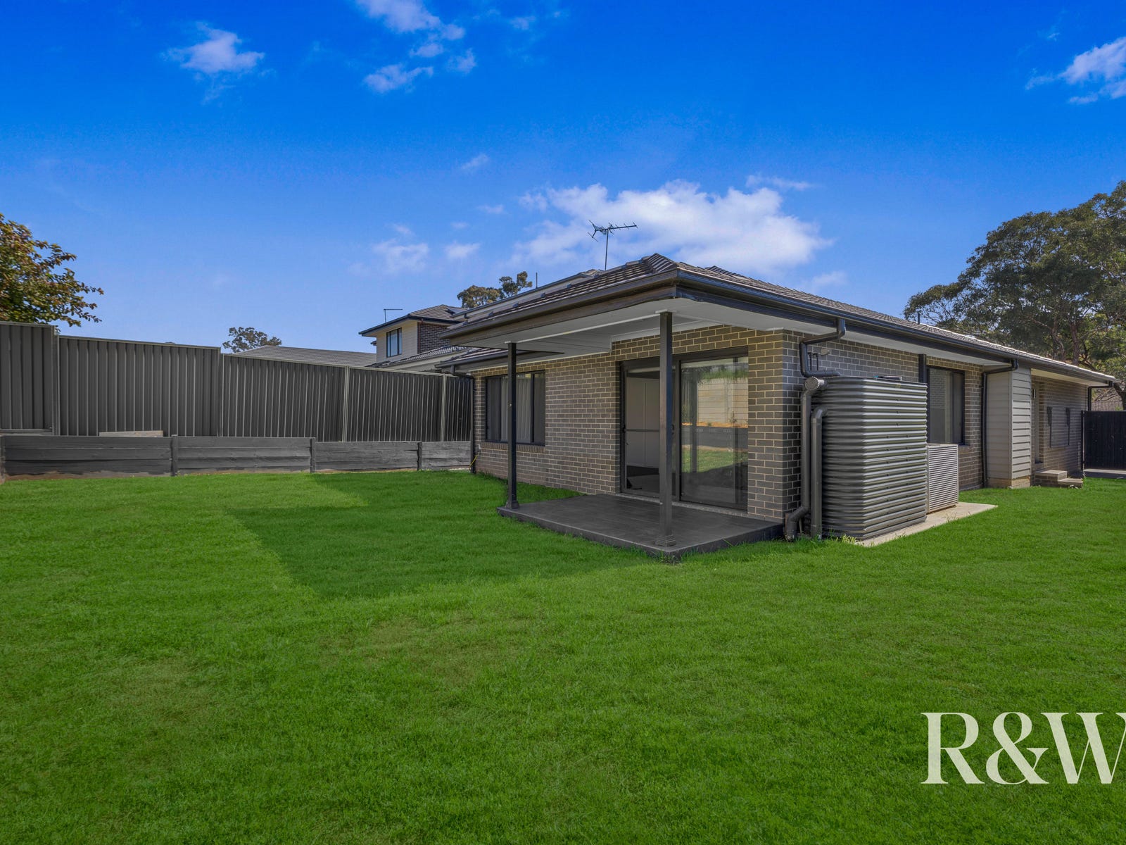 Covered alfresco and backyard at 9 Arkley Avenue